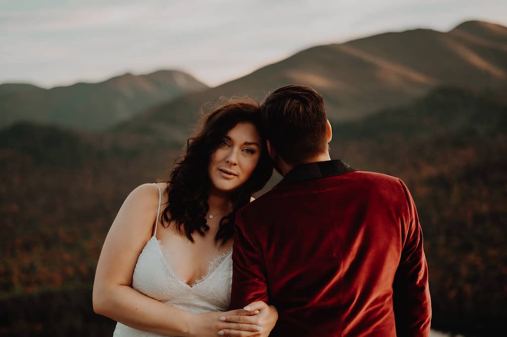 Bride and groom eloping in the mountains