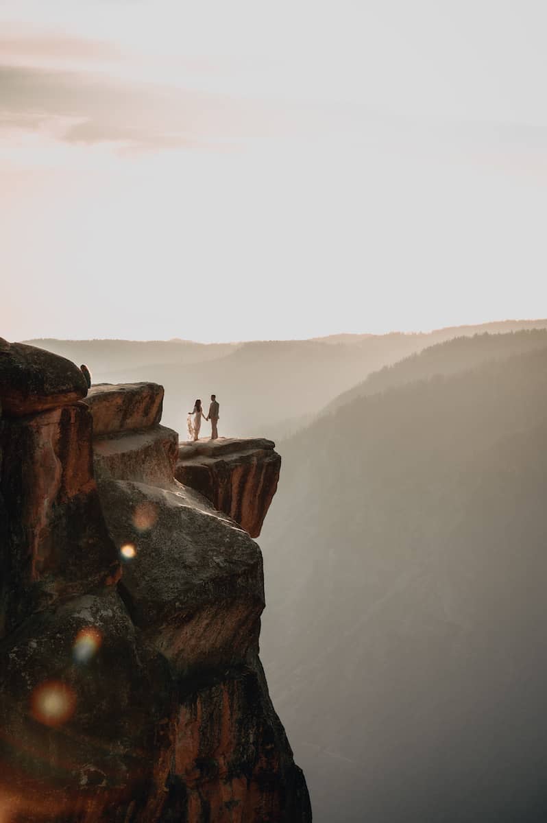 Elopement photography in Yosemite at Taft Point during sunset