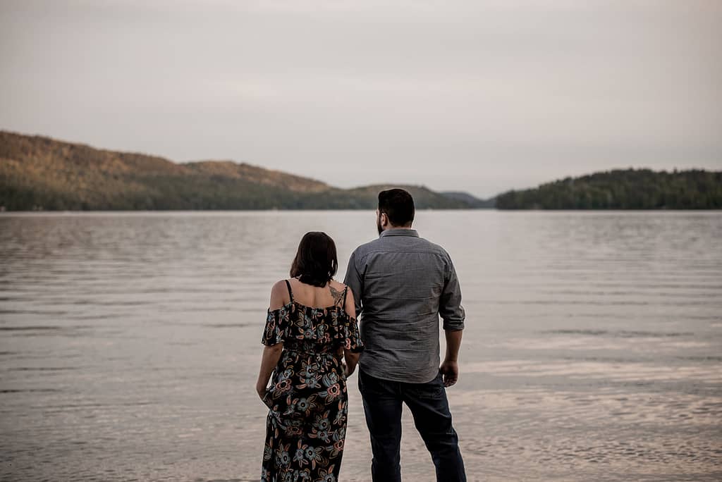 Proposing on the beach in Schroon Lake, NY in the Adirondacks